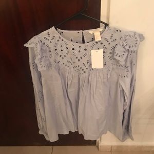 Light blue long sleeve with lace detail blouse